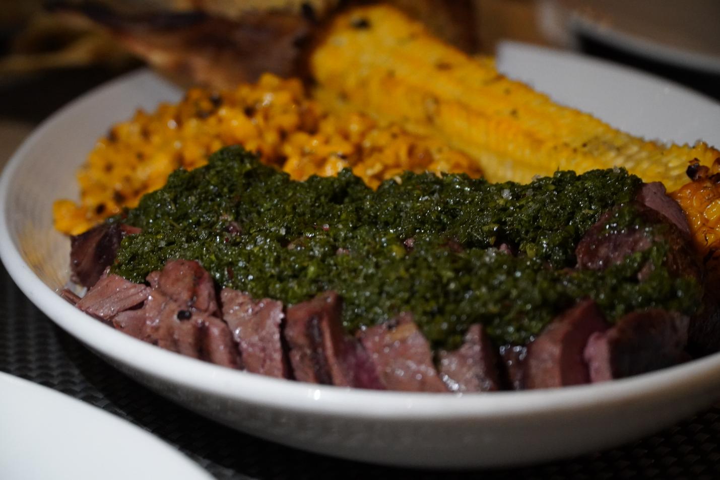 Beef, chimichurri sauce, and Mexican corn Elotes(1)