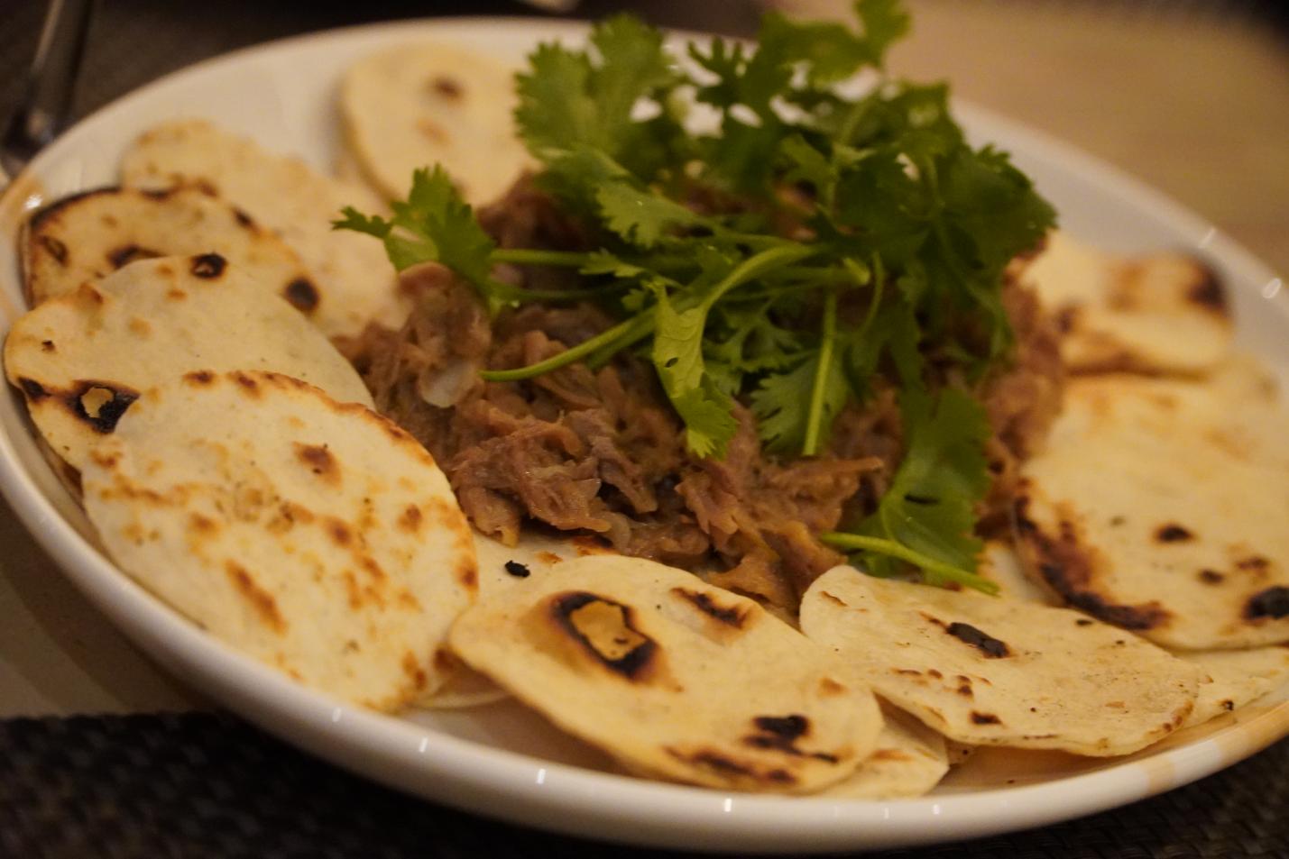 Tacos de Cochinita Pibil, lime, corn, and onions(1)