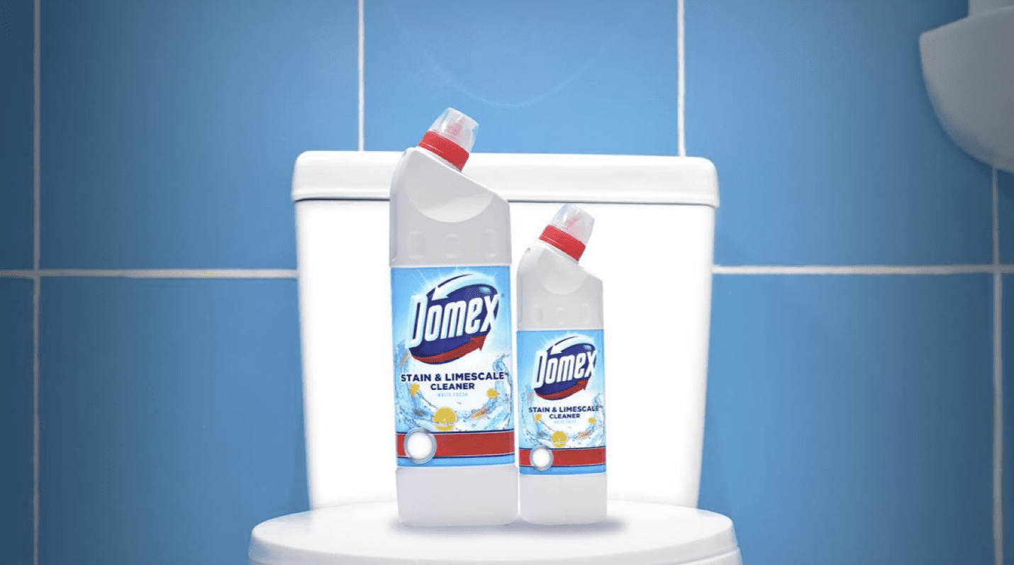 A bottle of toilet cleaner on a toilet Description automatically generated